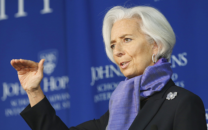 International Monetary Fund Managing Director Lagarde gestures as she speaks about the global economy at the Johns Hopkins School of Advanced International Studies in Washington